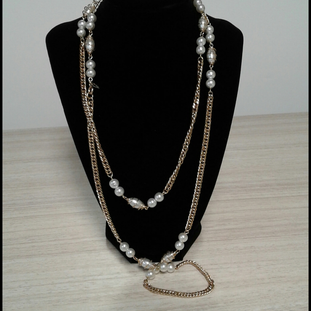 Pearl and gold tone Sarah Cov.
